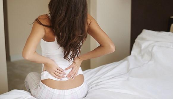 Боли в спине и пояснице у женщины